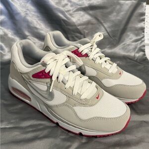 Nike Women's White and Gray Sneakers with Pink Accents